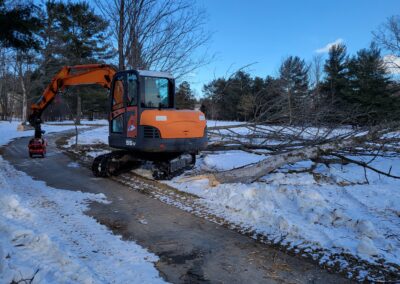 Clearing brush from a path.